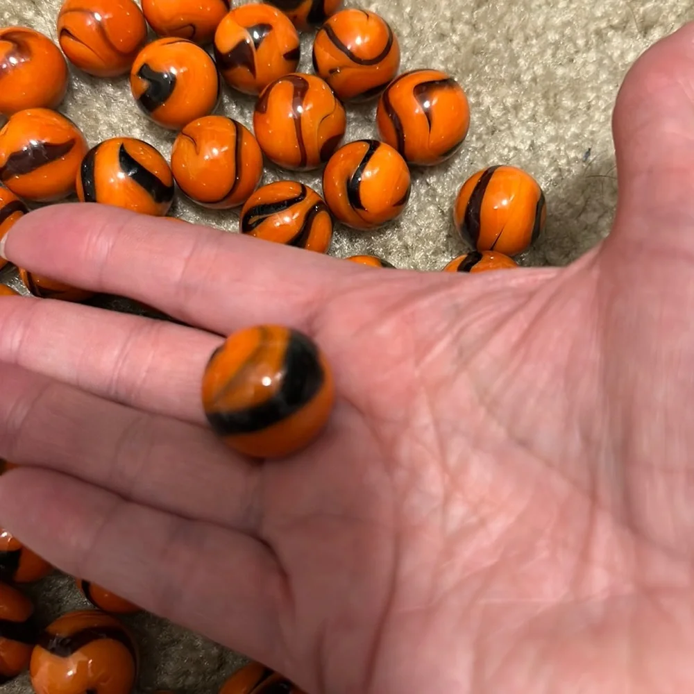 set of 5 bengal tiger mega glass marbles. Orange , black
